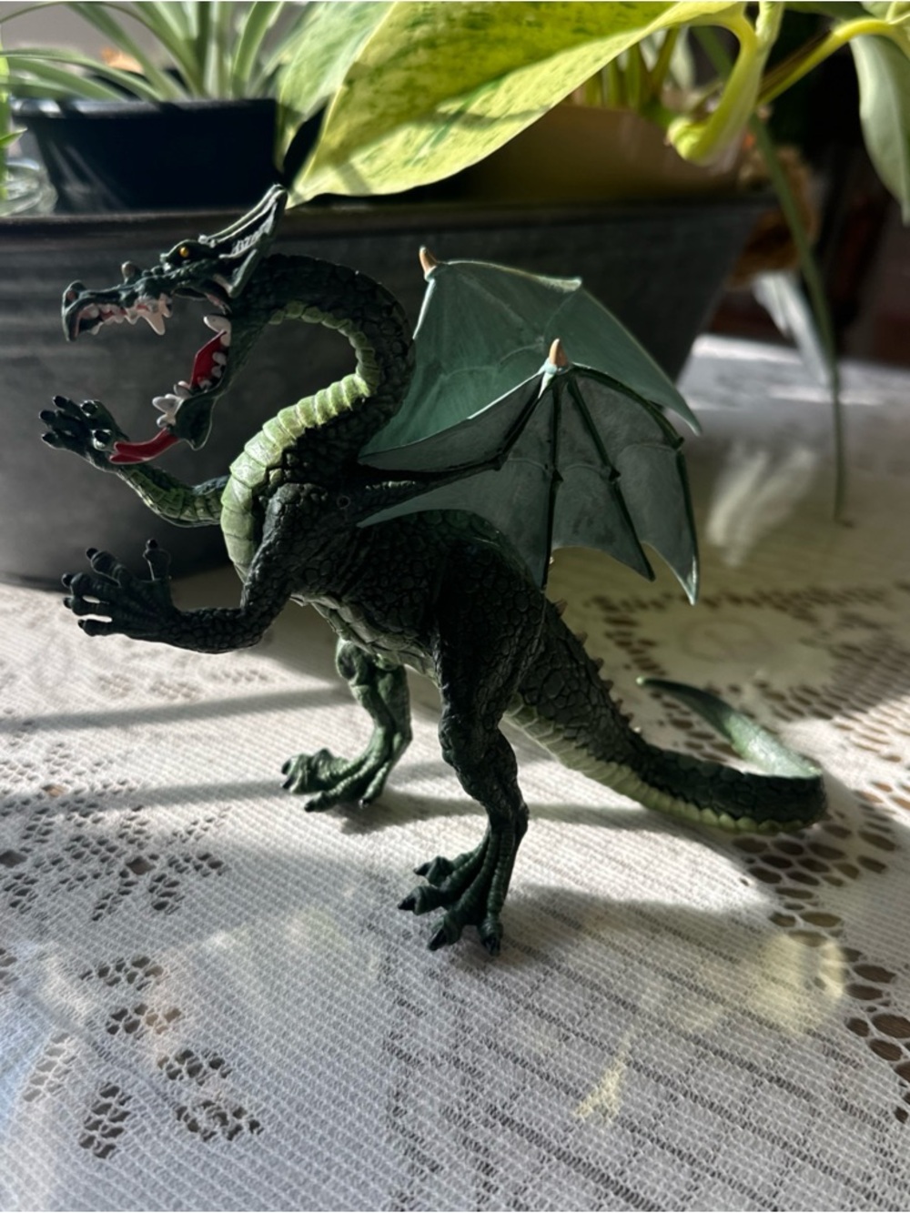 collectible dragon figurine, identified as a Plastoy Medieval Dragon